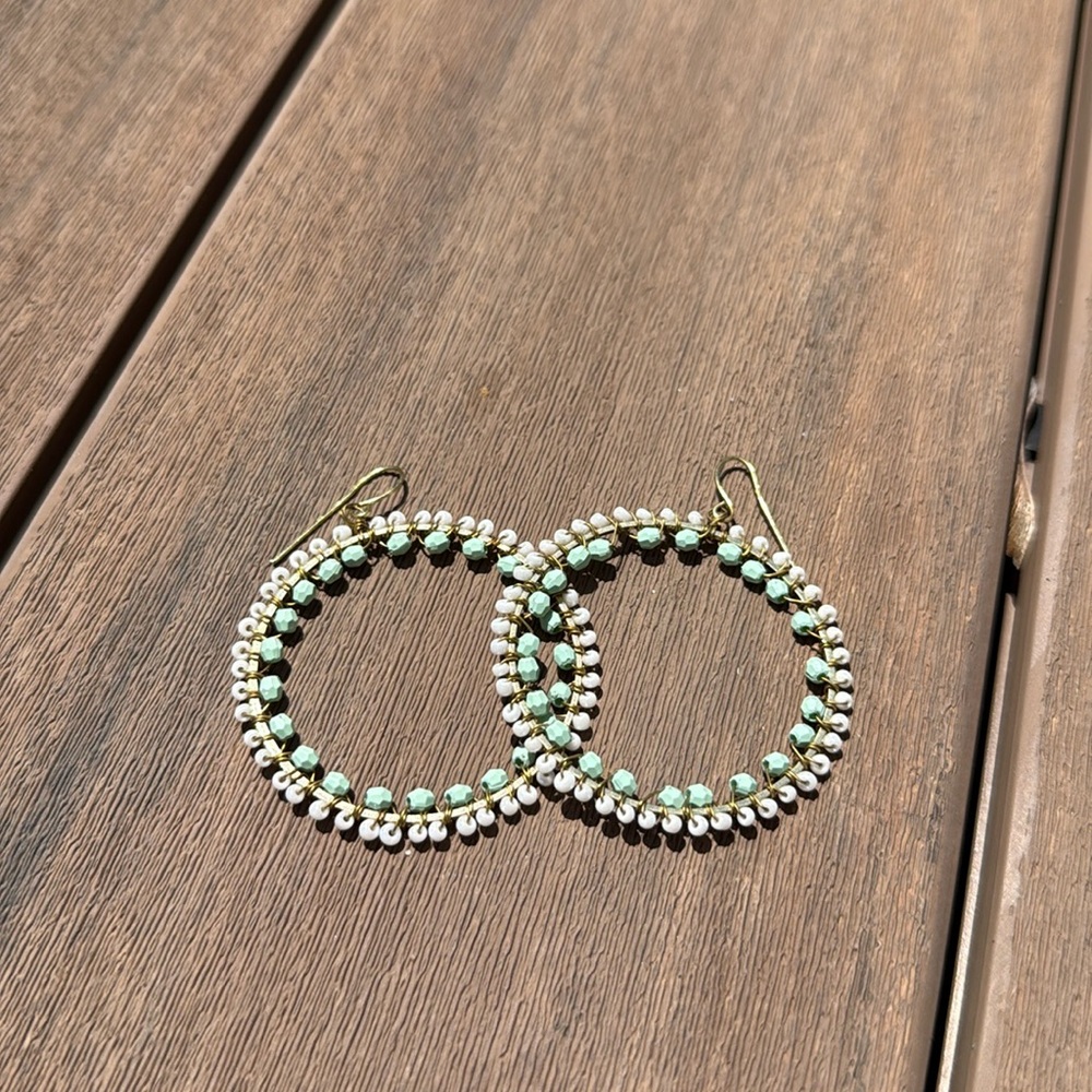 White and green beaded hoop earrings